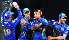 Pragyan Ojha (centre), Mitchel Johnson (left) were the architects of Mumbai Indians dramatic win over Chenna Super Kings on Sunday.