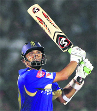 Rahul Dravid plays a shot against Pune Warriors in Jaipur on Sunday.