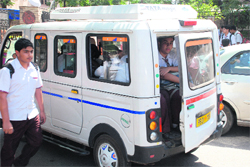 The rear door of a school van remains unlocked outside a school in Sector 14, Panchkula. 