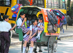 an overloaded rickshaw in Sector 14, Panchkula