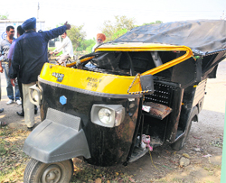 The damaged auto-rickshaw after it overturned near Kharar on Monday