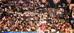 A huge crowd looks on as the Royal Challengers Bangalore batsman Chris Gayle plays at the PCA stadium in Mohali on Monday.