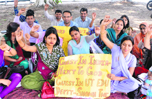 UT guest teachers protest at Sector 17, Chandigarh, on Monday. 