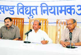 Jagmohan Lal, Chairman, Uttarakhand Electricity Regulatory Commission, addresses a press conference in Dehradun on Monday