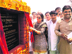 Public Health Engineering Minister Kiran Choudhry lays the foundation stone of a water project at Dagdoli in Bhiwani on Monday. A Tribune photograph