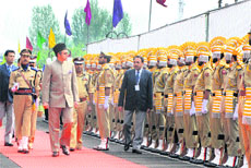Jammu and Kashmir Chief Minister Omar Abdullah inspects the guard of honour at the civil secretariat complex on the first day of the Durbar Move in Srinagar on Monday.