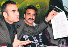 Doctors Association of Kashmir president Dr Nisar-ul-Hassan addresses a press conference.