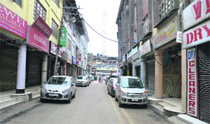 A market wears a deserted look during a shutdown in Srinagar on Monday.