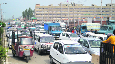 Heavy traffic jam in front of the Civil Secretariat on the first day of the Durbar Move in Srinagar on Monday.