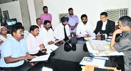 Members of the Dr Ambedkar Ekta Mission, Punjab, and the Bharatiya Valmiki Dharam Samaj meet DCP Harsh Bansal over the controversy surrounding a Hindi film, Shootout at Wadala, in Ludhiana on Monday.