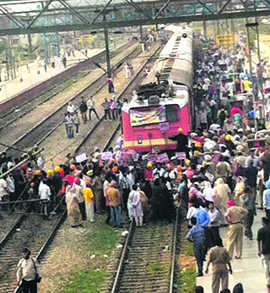 Protesters block a rail track at the Phagwara station on Monday.