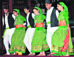 A group dance is presented at the annual cultural function of FRI Deemed University on Monday night in Dehradun. 