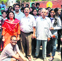 The group of law students with villagers at Jachh in Nurpur recently.