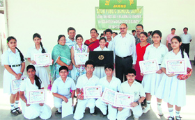 Winners of the The Tribune Cognizance Scrap Book Competition with their cerificates in Jammu on Tuesday.