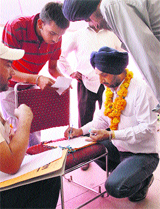 A candidate files his nomination papers on the last day in Jalandhar on Tuesday.