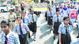 School students participate in an awareness rally organised to mark the Road Safety Week in Bathinda on Wednesday.