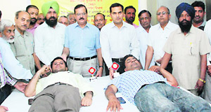 Deputy Commissioner KK Yadav and Civil Surgeon Dr Ajay Sahni were present at the blood donation camp organised to mark the World Red Cross Day in Bathinda on Wednesday. 