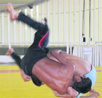 Wrestlers during a practice session at Skating Rink, Sector 10, Chandigarh, on Wednesday. a Tribune photograph