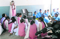 Students attend a class in a verandah of Mata Gujri Senior Secondary School in Fatehgarh Sahib. A Tribune Photograph