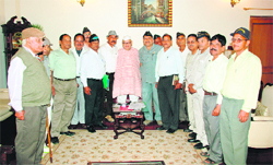 A delegation of ex-servicemen presents a memorandum of demands to Governor Aziz Qureshi at Raj Bhavan in Dehradun on Wednesday.