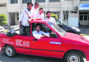 Students of CT Group of Institutions with the smart car Mechtra in Jalandhar on Wednesday. 