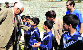 Governer NN Vohra interacts with students on the World Red Cross Day in Srinagar on Wednesday.