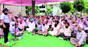 Patwaris stage a protest at the Mini-Secretariat, Ludhiana, on Wednesday, demanding filling of vacant posts.