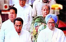 Prime Minister Manmohan Singh along with other ministers in the Rajya Sabha in New Delhi on the concluding day of the budget session on Wednesday