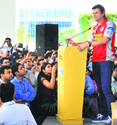Adam Gilchrist speaks at the Infosys Campus on Tuesday.