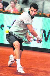 Dimitrov beat Djokovic 7-6, 6-7, 6-3. 
