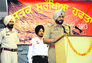 Senior Superintendent of Police Ravcharan Singh Brar addresses those present at the seminar. 