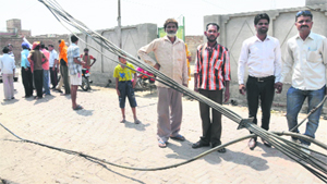 Low hanging wires caused a short-circuit damaging electrical appliances. 