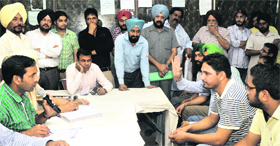 Auction of registration numbers underway at Phase I in Mohali on Thursday.