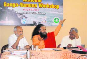 Swami Chidanand Saraswati speaks at a workshop on the Ganga and Yamuna rivers in Rishikesh on Thursday