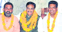 Former Chief Minister Ramesh Pokhriyal Nishank with legislator Swami Yatishwaranand in Haridwar on Thursday. Tribune photo: Rameshwar Gaur