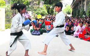 Mehak and Hemant display self-defence techniques in MM College of Education, Fatehabad. 