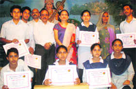 A group of winners of a scrap book competition organised by The Tribune on Thursday.
