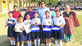 Students of MHAC School, Nagbani, who bagged top positions in a competition titled Best out of waste in Jammu.