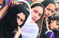 Pakistan Tehreek-e-Insaf supporters at a rally in Narowal area of Punjab on Thursday.  AFP
