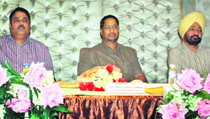 Industry Minister Anil Joshi (centre) at a seminar hosted by Punjab Pollution Control Board in Amritsar on Friday. 