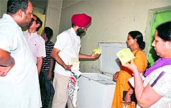 An inspection team from the Punjab State Commission for Protection of Child Rights checking frozen food items at the Delhi Public School in Bathinda on Friday