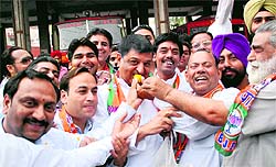 Sweet success: BJP activists offer sweets to Parminder Goyal after he was appointed the president of the saffron partys district (Urban) unit, in Bathinda on Friday