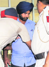 The accused in police custody in Mohali.