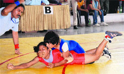 Women grapplers in action during a match of the Junior National Wrestling Championship in Chandigarh on Friday.