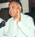 Transport Minister GS Bali addresses mediapersons in Shimla on Friday.