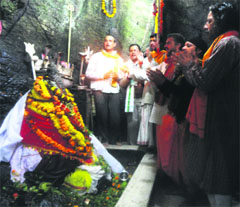 Devotees pay obeisance at Shiv Khori cave shrine in Katra on Friday. A Tribune Photo