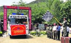 Sector Commander, Tain Sector, Rashtriya Rifles, flags off the motivational tour in Rajouri on Friday. photo: Ranjit Thakur