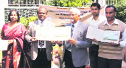 Special stamps being released at the General Post Office in Srinagar on Friday. a tribune Photograph 
