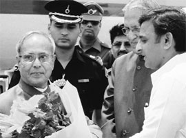 President Pranab Mukherjee is received by Uttar Pradesh CM Akhiesh Yadav on his arrival at the Ch Charan Singh Airport in Lucknow on Friday. 