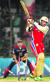 Chris Gayles timber is shattered on Friday. 
